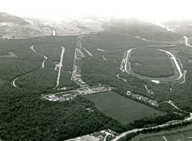 This aerial view shows the endurance track (left) in Voujeaucourt and the speed ring (right) in Valentigney, with the Doubs in the foreground and Montbéliard in the distance.© IXO Collections SAS - Tous droits réservés. Crédits photo © Peugeot