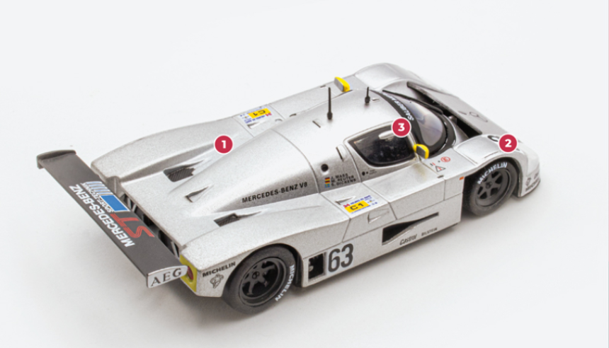 1. The bodywork and rear suspension of the C9 have been redesigned compared to previous models.2. On the cars competing at Le Mans, the slots above the front wheels have been replaced by solid panels.3. The C9's body is made of aluminium, like that of previous C9s. The carbon structure only appeared on the 1990 C11.© IXO Collections SAS - Tous droits réservés. 