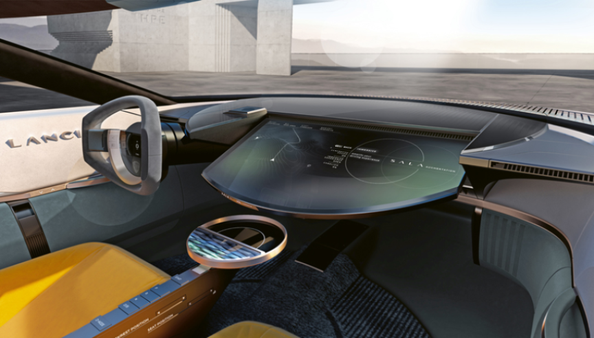 La planche de bord très futuriste intègre une grande console centrale ronde et inclinable qui se prolonge visuellement vers l’extérieur de la voiture par une astuce de design. © IXO Collections SAS - Tous droits réservés. Crédits photo © © Lancia D.R.