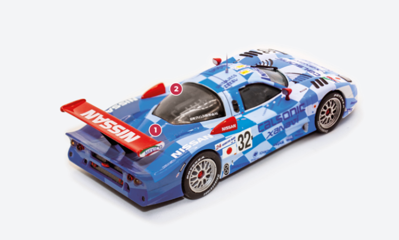 1. La Nissan R390 GT1 de 1998 se distingue surtout par son arrière allongé par rapport au modèle de l’année précédente.2. Le moteur V8 biturbo de 3,5 litres est semblable au groupe des précédentes Groupe C. Opportunément révisé et malgré la bride de l’admission, il développe plus de 650 ch.© IXO Collections SAS - Tous droits réservés. 